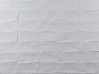 Wandtegel Revoir Paris atelier blanc de lin glans 6,2x25